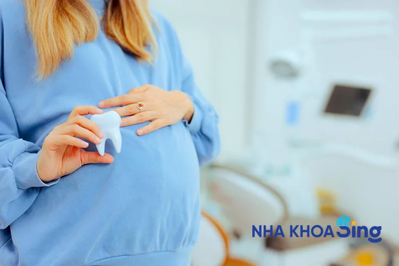 phu-nu-mang-thai-co-nen-trong-rang-implant-1